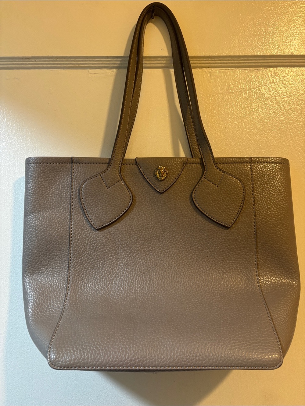 Anne Klein Pebbled Taupe Leather Tote with Heart-Trim Handles and Gold Emblem